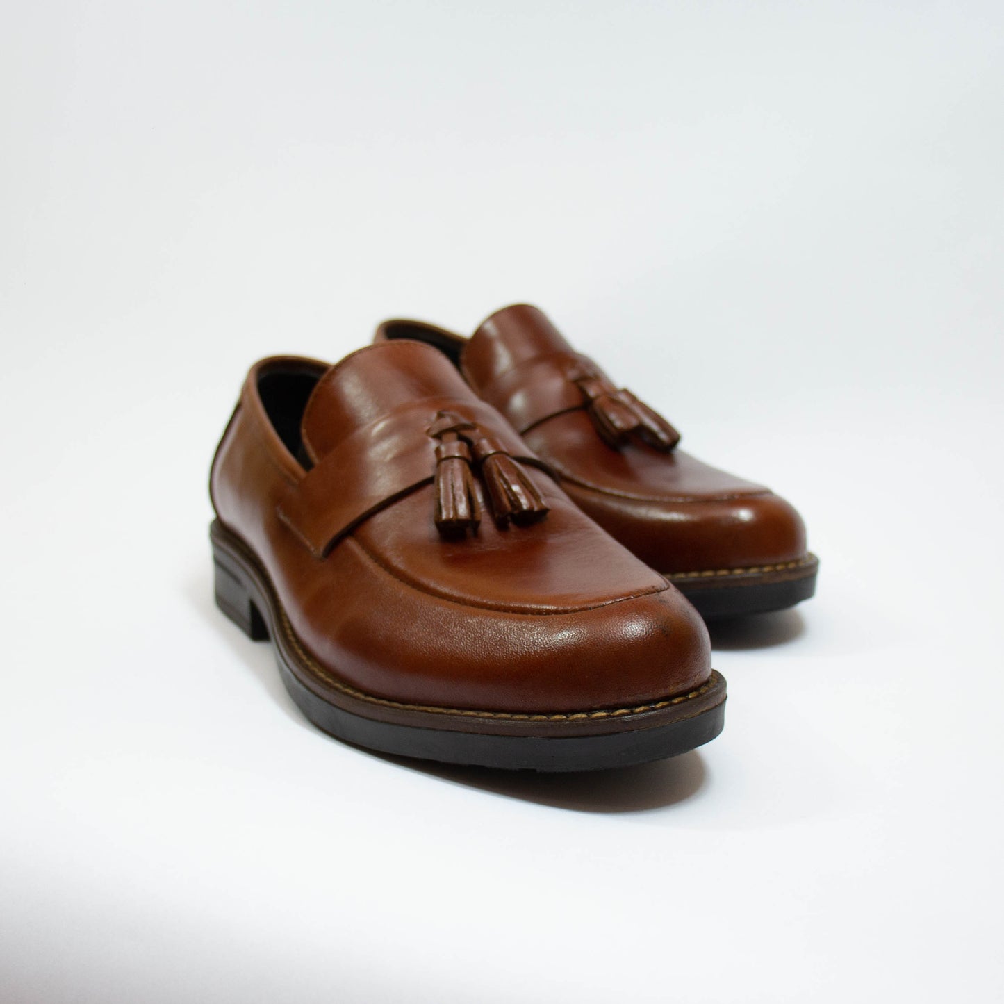 MOCASSIN POMPON TABACO CUIR